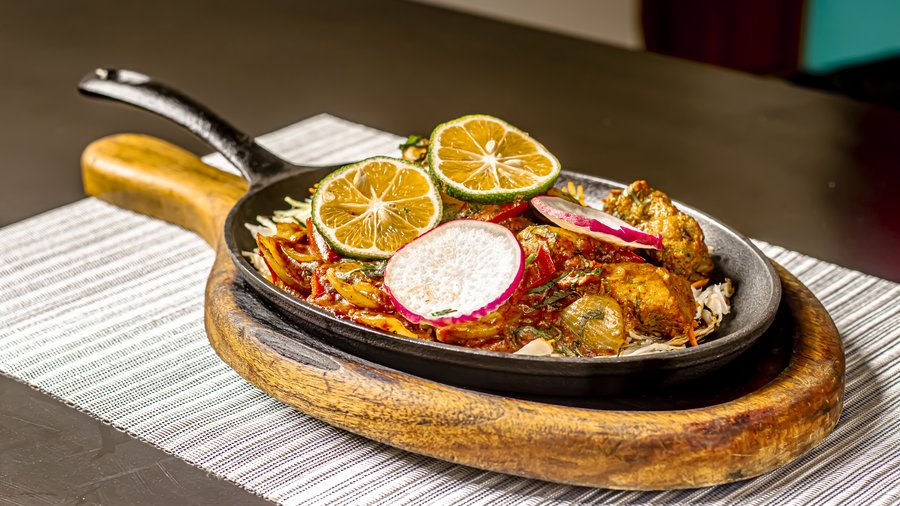 Table set with Indian cuisine for guests